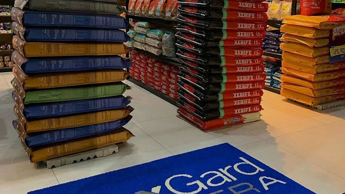 Capa do guia "Como escolher um tapete para sua empresa" sobre Empresas e segmentos