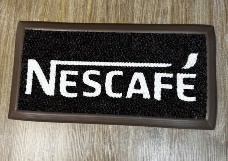 Tapete secante personalizado Nescafé para área comercial